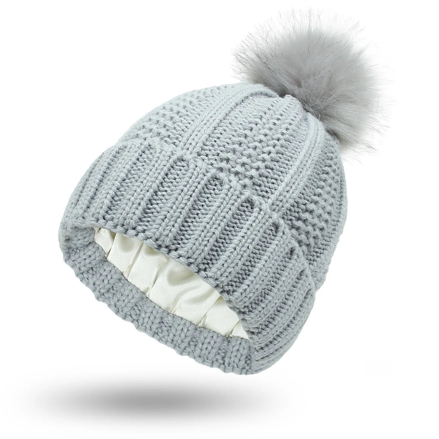 Women's satin lined wool beanie with faux fur pom pom in classic winter colours