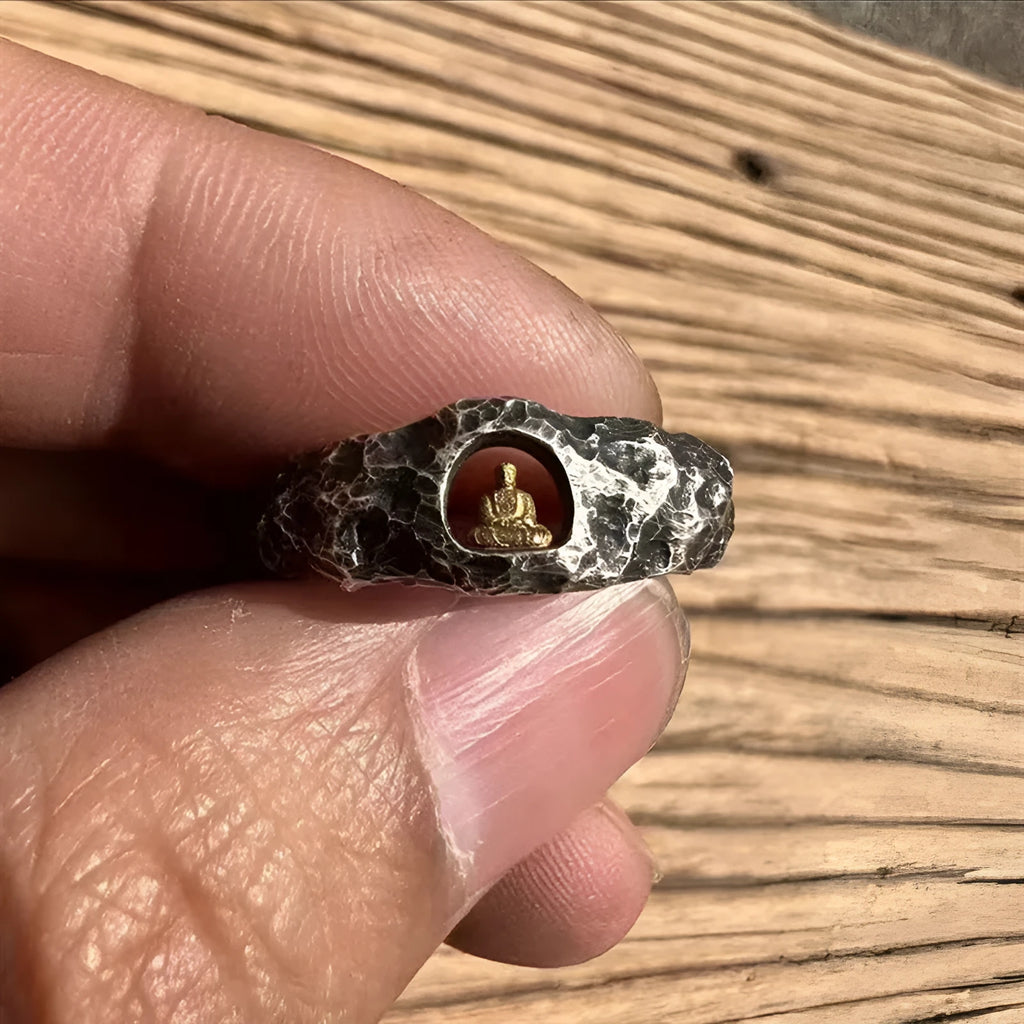 Hand-forged copper Buddha ring with grotto rock texture, shown in size 8.