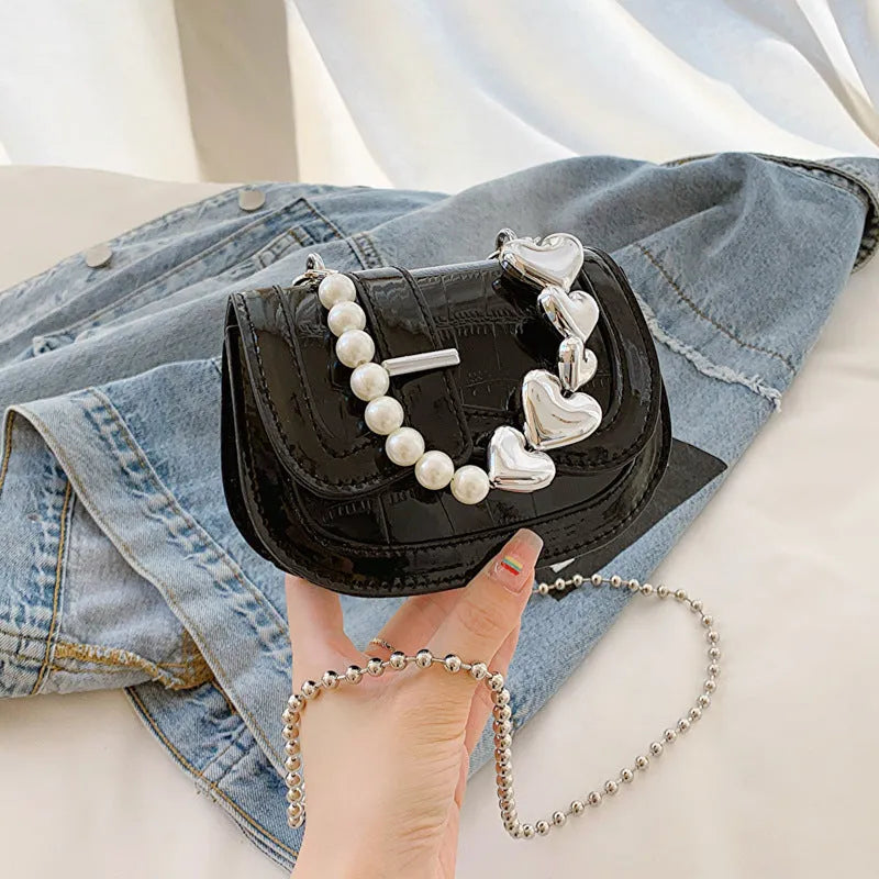 Women's black PU mini tote crossbody bag with phone pocket and single shoulder strap