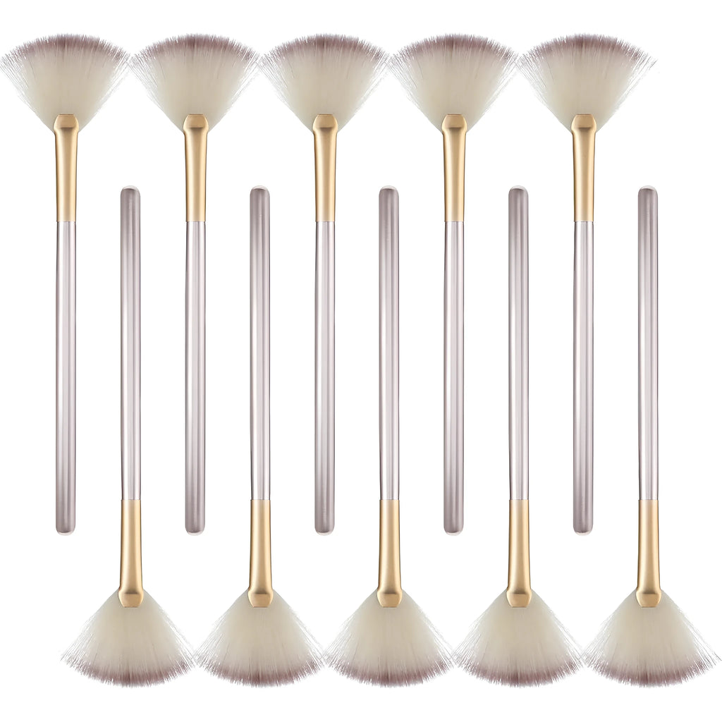 Ten champagne-coloured acrylic handle fan brushes with soft fibre bristles and individual clear protective covers.