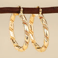 Geometric golden copper ear clip for women with ring and line design elements