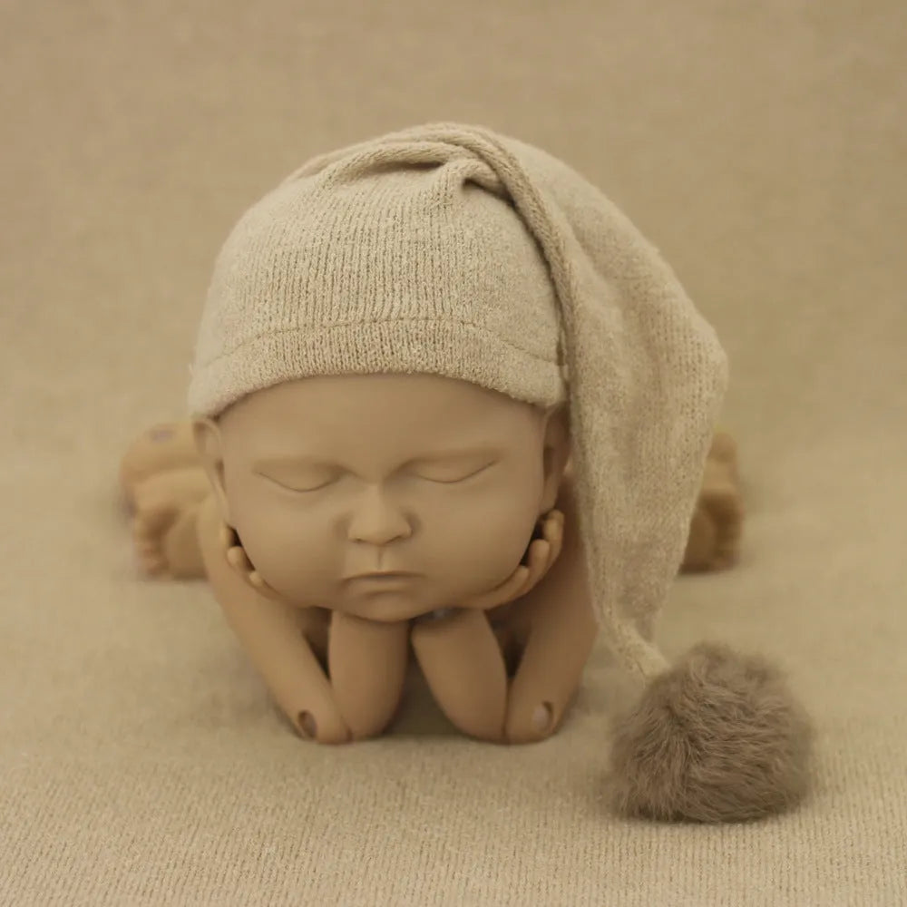 Hand-woven yarn baby photography hat in conical style, available in twelve colour options