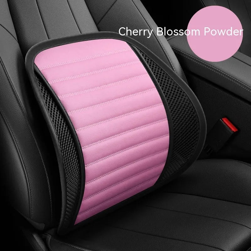 Leather lumbar support cushion on a car seat, shown in sapphire blue colour.