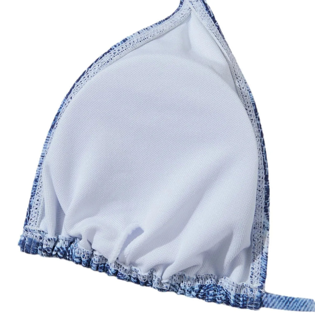 Denim blue printed women's bikini set with strap design on a model, showing front and back.