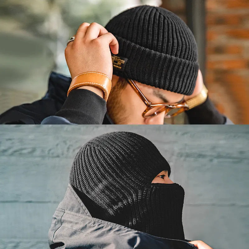 Vintage knitted melon skin warm beanie in black with patch detail on a plain background