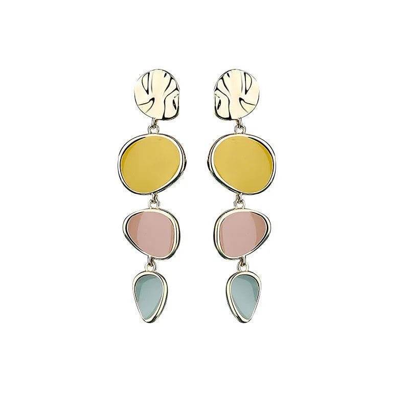 A pair of simple disc-shaped alloy earrings with a blended Morandi three-colour oil drip finish.