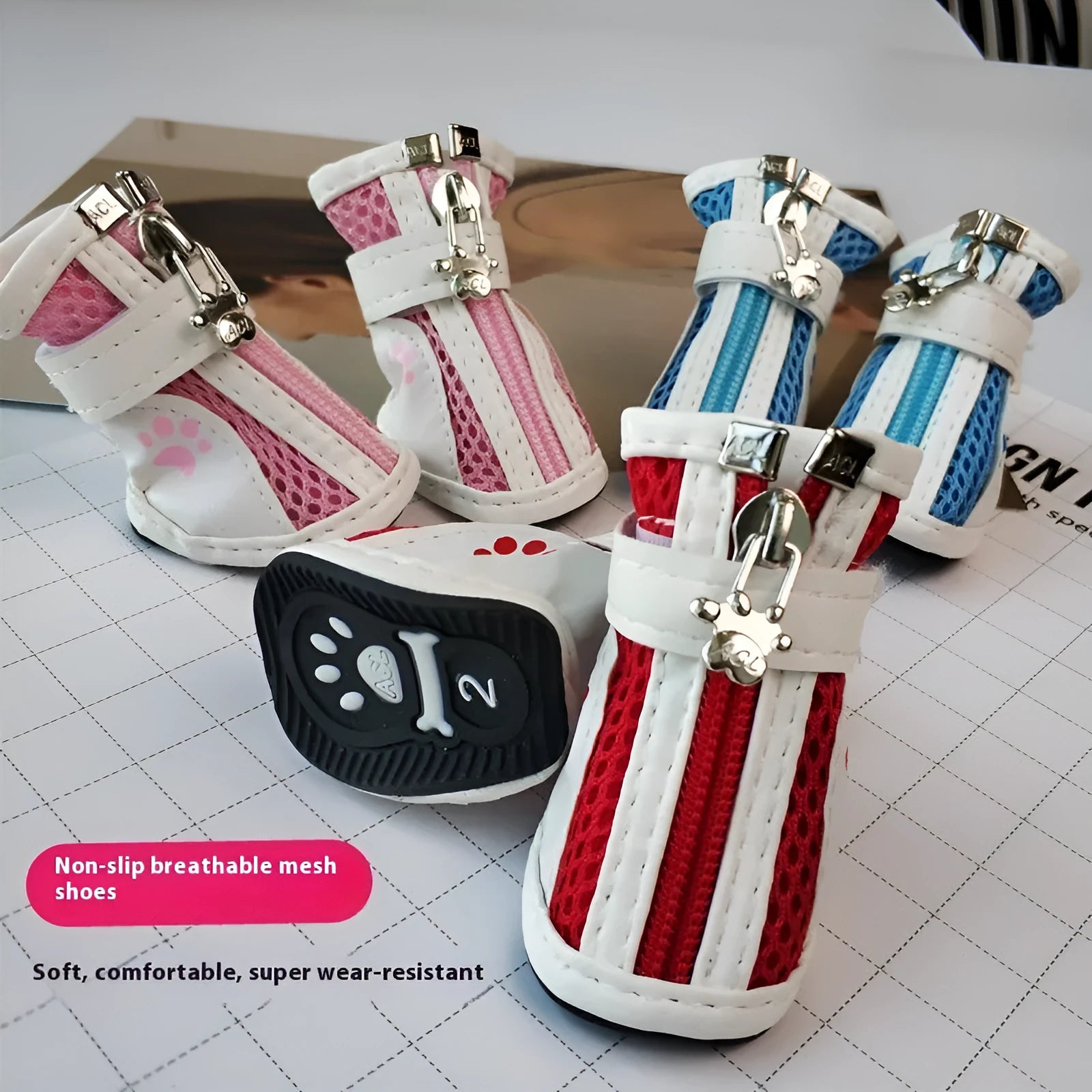 Blue zipper dog shoes with non-slip sole from a four-pair pet sneaker set.