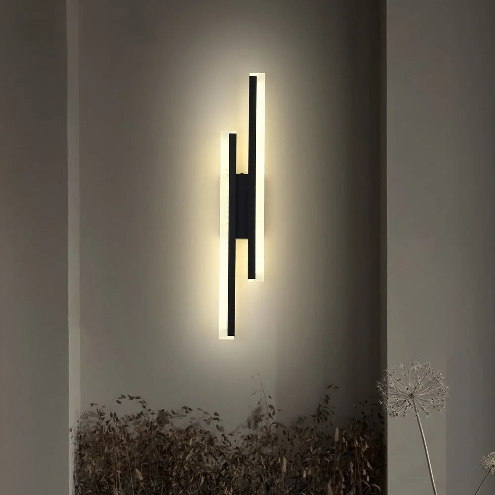 Modern gold double line wall lamp mounted on a wall, 500mm long with linear lighting.