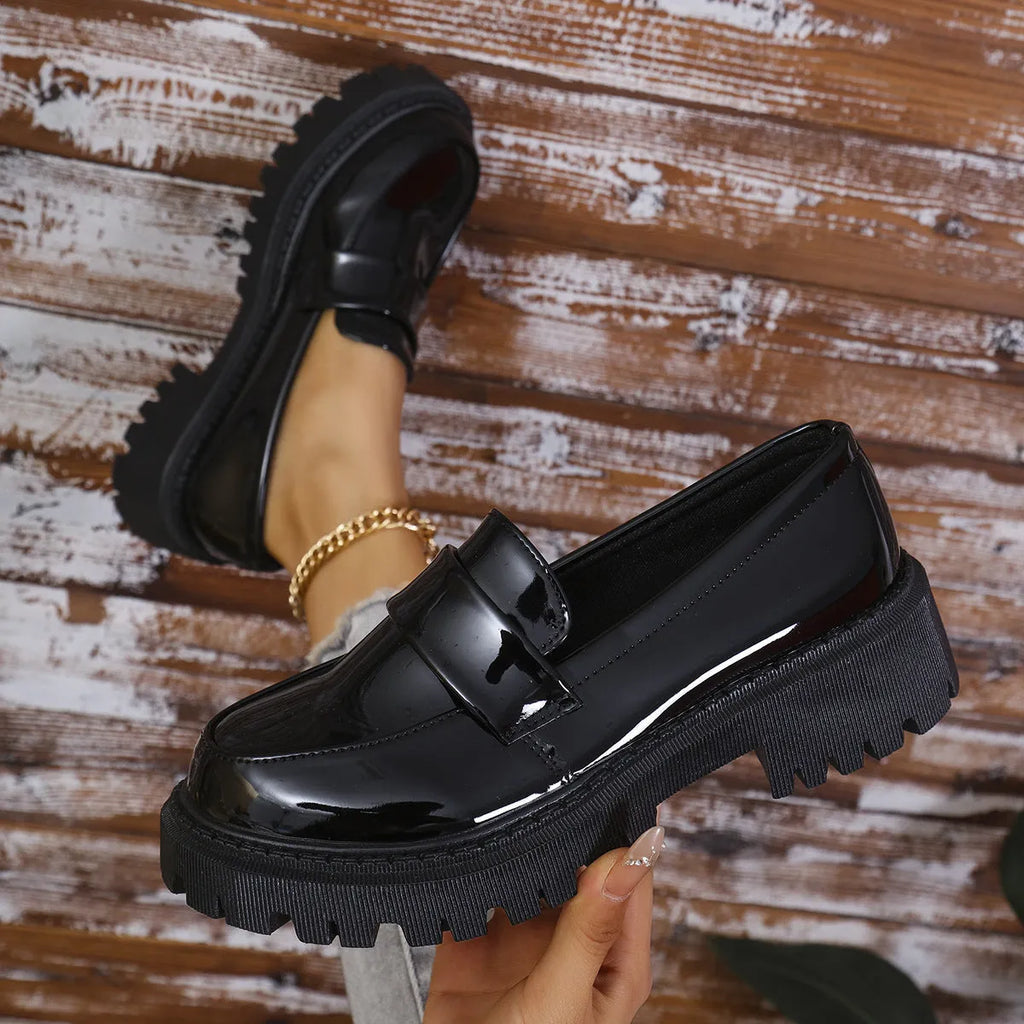 Plus size British style slip-on loafers with chunky platform heel in black, wine red, and green colours