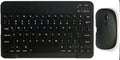 10-inch solid colour Bluetooth keyboard and rechargeable dual-mode mouse set on a desk.