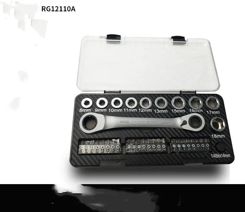 Ratchet wrench set with multiple sockets and bit heads arranged on a workbench