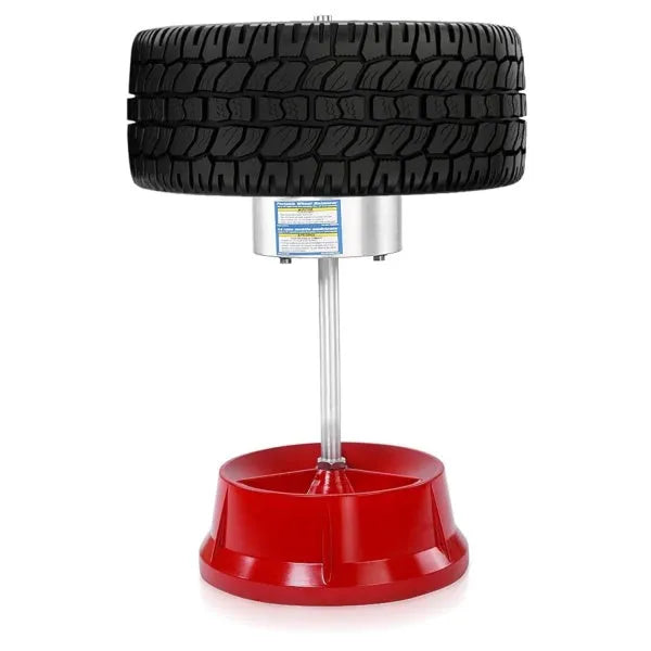 Portable aluminium head hub balancer for car and truck tyres with bull's eye level on a black enamel base.