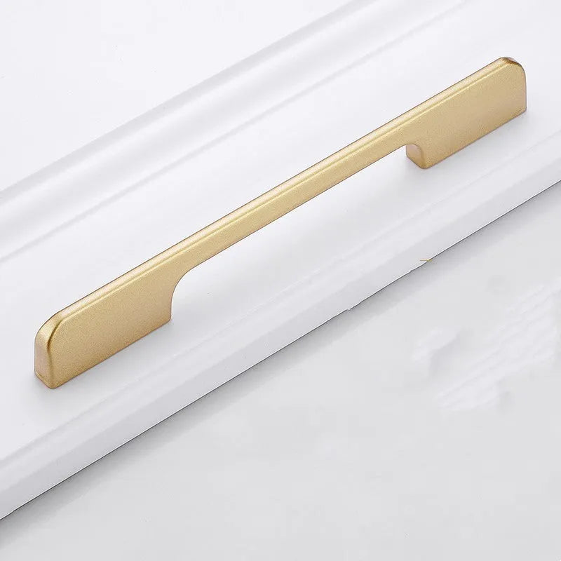 Gold T-shaped aluminium cabinet handle for single hole mounting.