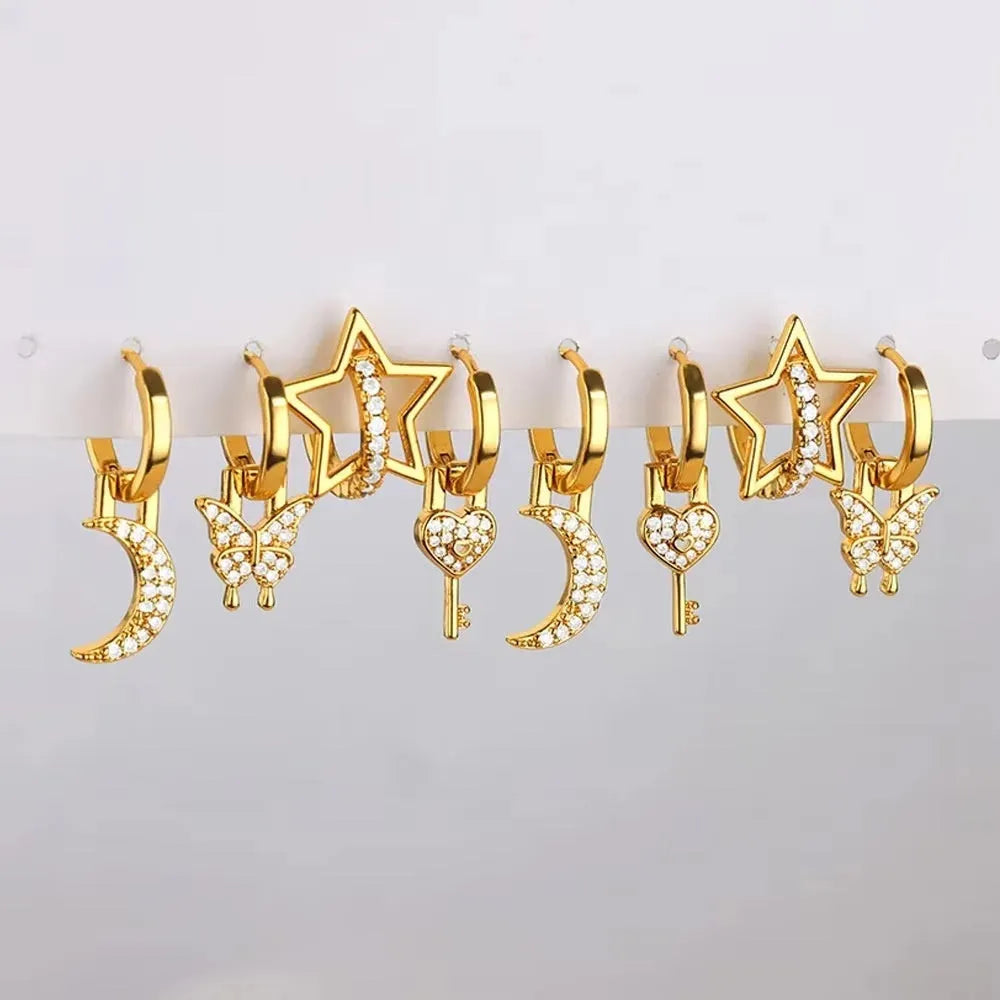 Women's geometric butterfly earrings with heart, bow and star shapes in copper with diamond finish