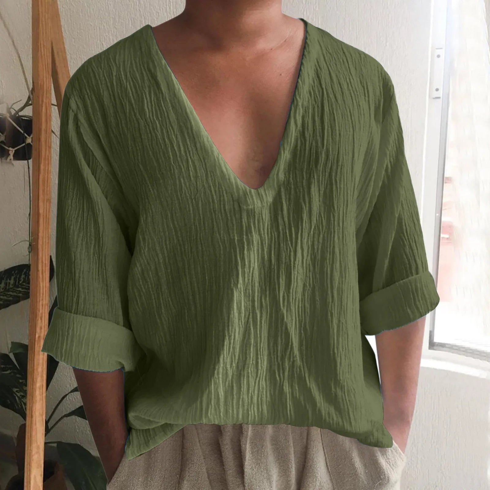 Men's washed cotton long sleeve V-neck T-shirt in solid colours on a size chart