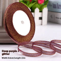 Roll of 0.6cm wide polyester gift ribbon in various colours including gold leaf, coffee and sky blue options