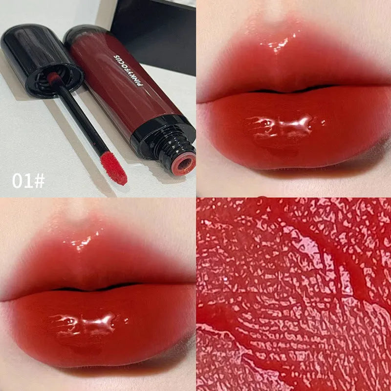 Mirror Lip Paint lacquer tube in six dark berry and tomato red shades for glossy, durable wear.