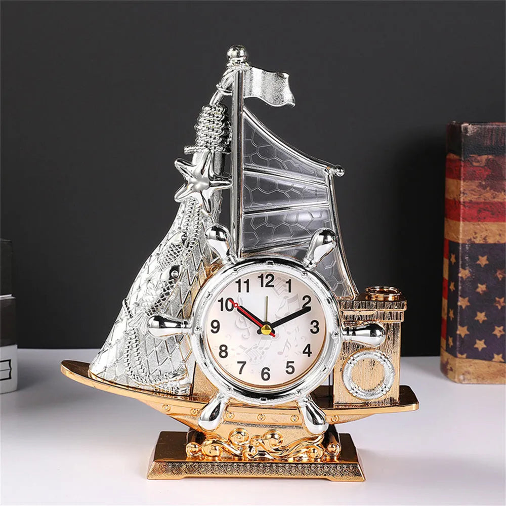 Creative contemporary alarm clock in a choice of gold or silver finish for home decor.