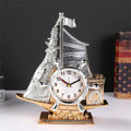 Creative contemporary alarm clock in a choice of gold or silver finish for home decor.