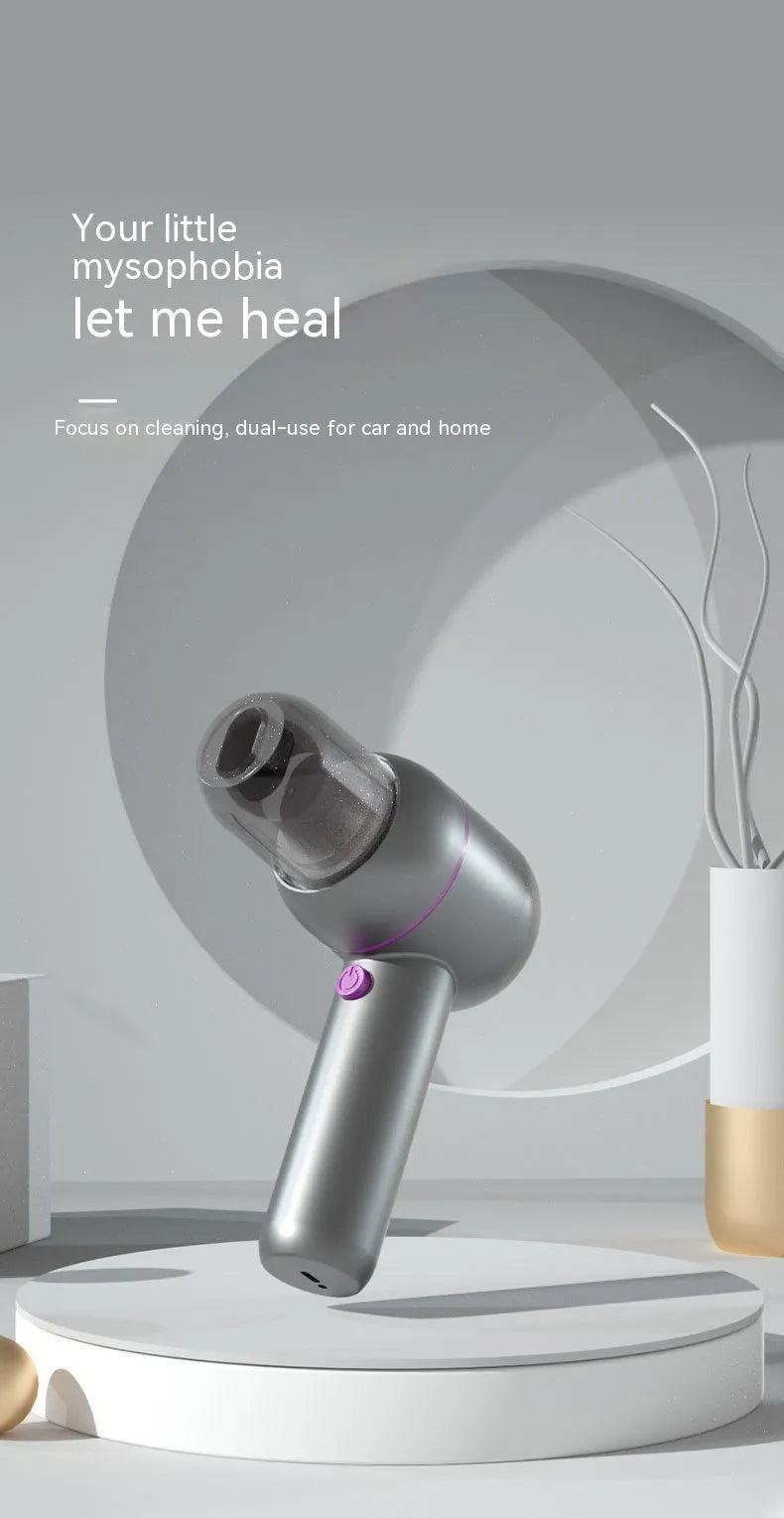 Grey handheld portable car cleaner with rechargeable battery, dust bin, and suction nozzles