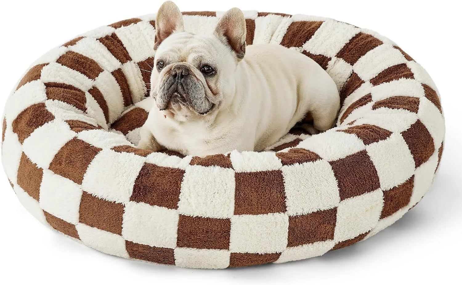 Round plaid-patterned dog bed on a floor, shown in a blue and white colour variant.