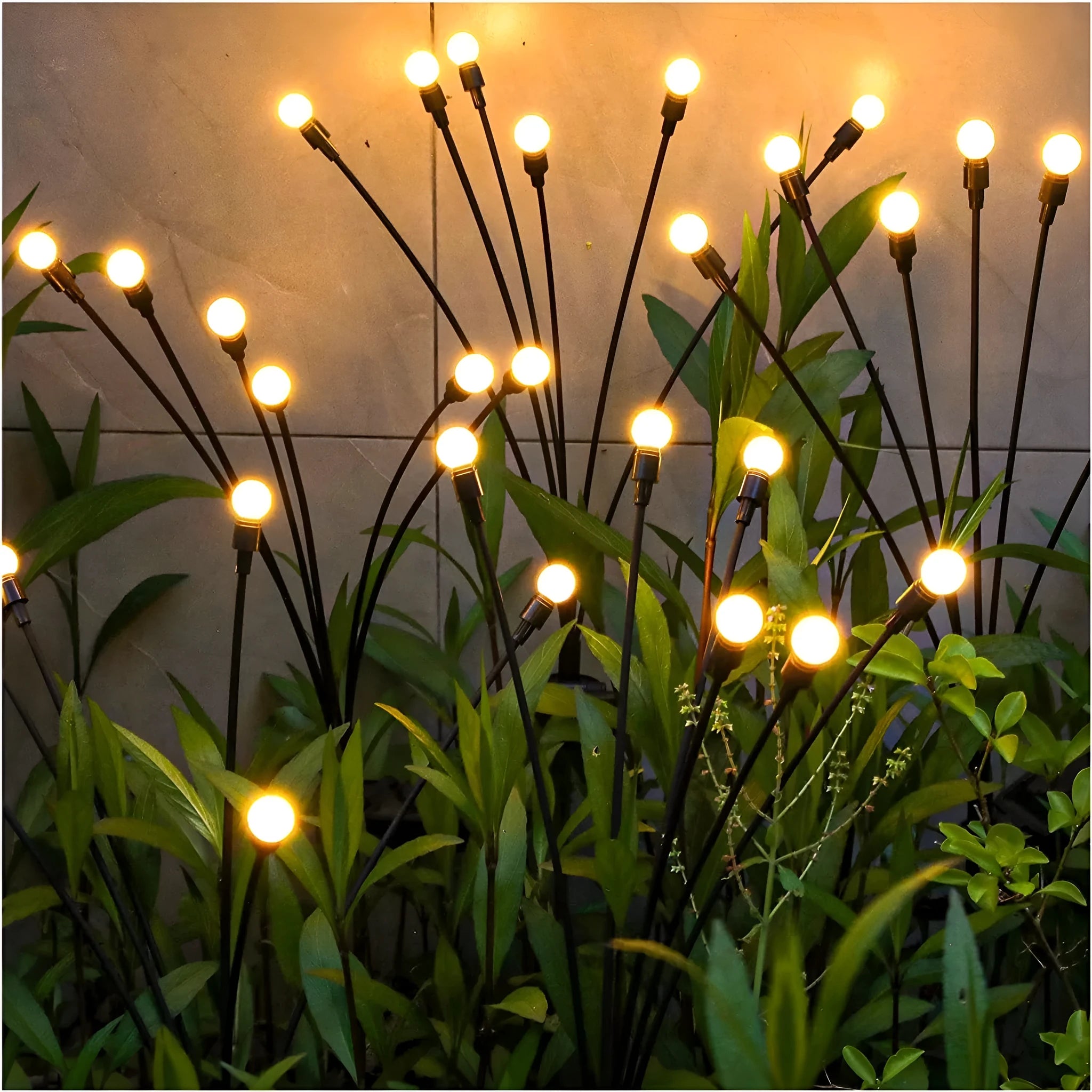 Solar-powered LED garden ground light with multiple light heads and a stainless steel spike for installation.