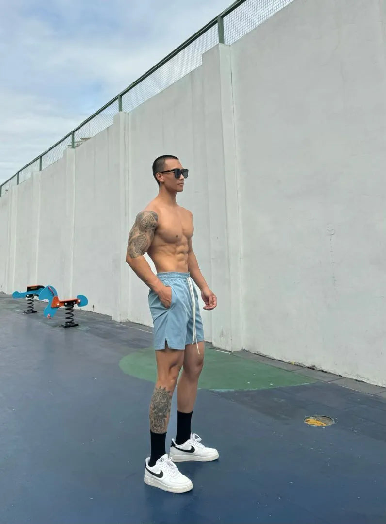 Men's ice silk quick-drying double-layer casual shorts in multiple colours.