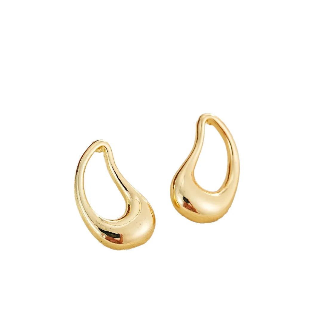 Set of four ladies geometric irregular shaped light luxury retro earrings in gold and silver tone finish