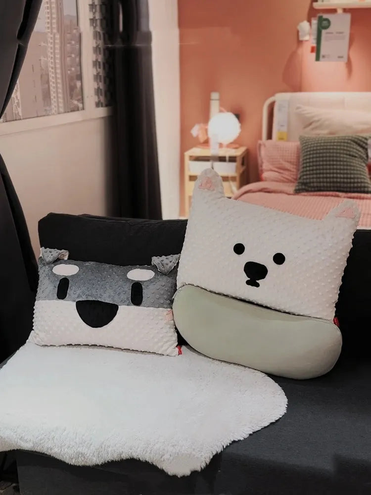Grey Schnauzer or white West Highland Terrier themed pet pillow cushion on a sofa