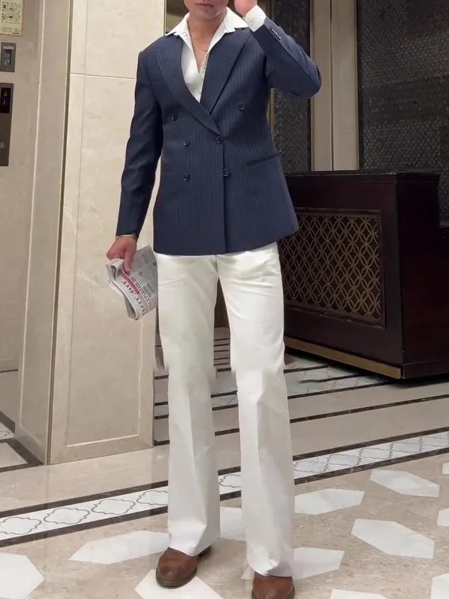 Men's striped double-breasted polyester blazer showing classic design and regular fit