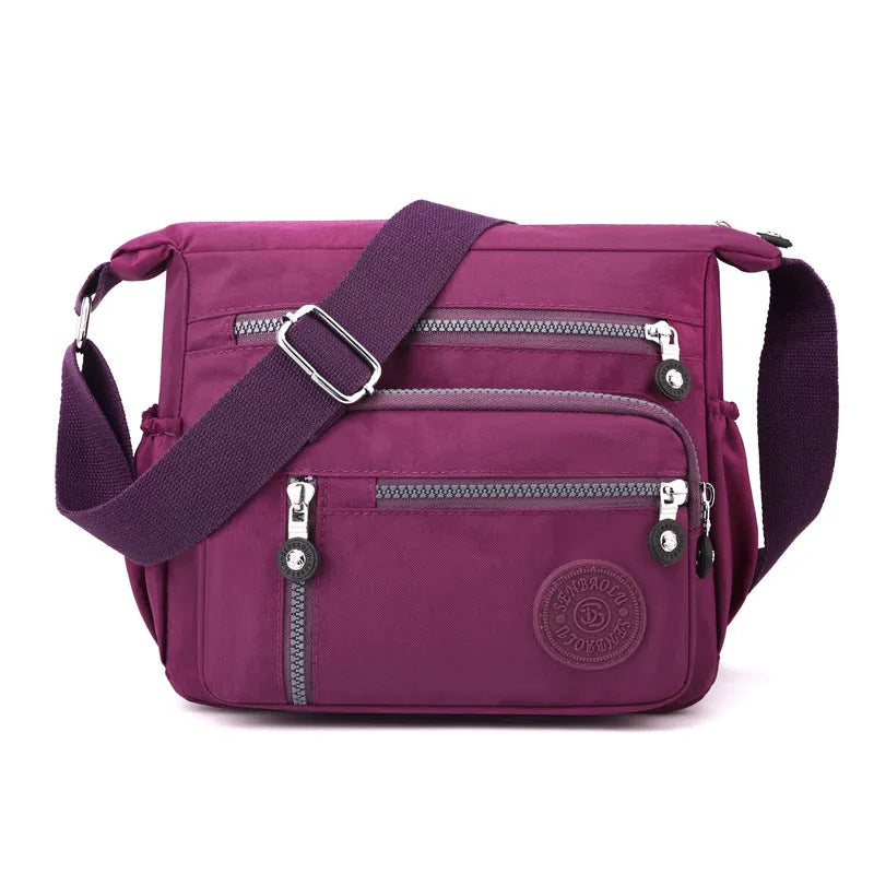 Nylon messenger shoulder bag in square vertical design with single strap and lining