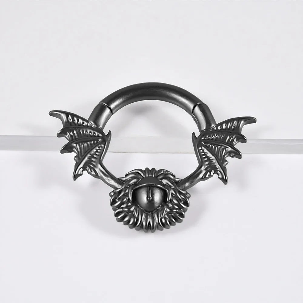 A pair of geometric cone and round shaped copper ear cuffs with magnetic clip-on fasteners.