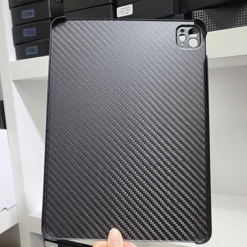 Carbon fibre hard case for Apple iPad Pro 11 with embossed plaid pattern showing three surface finish options