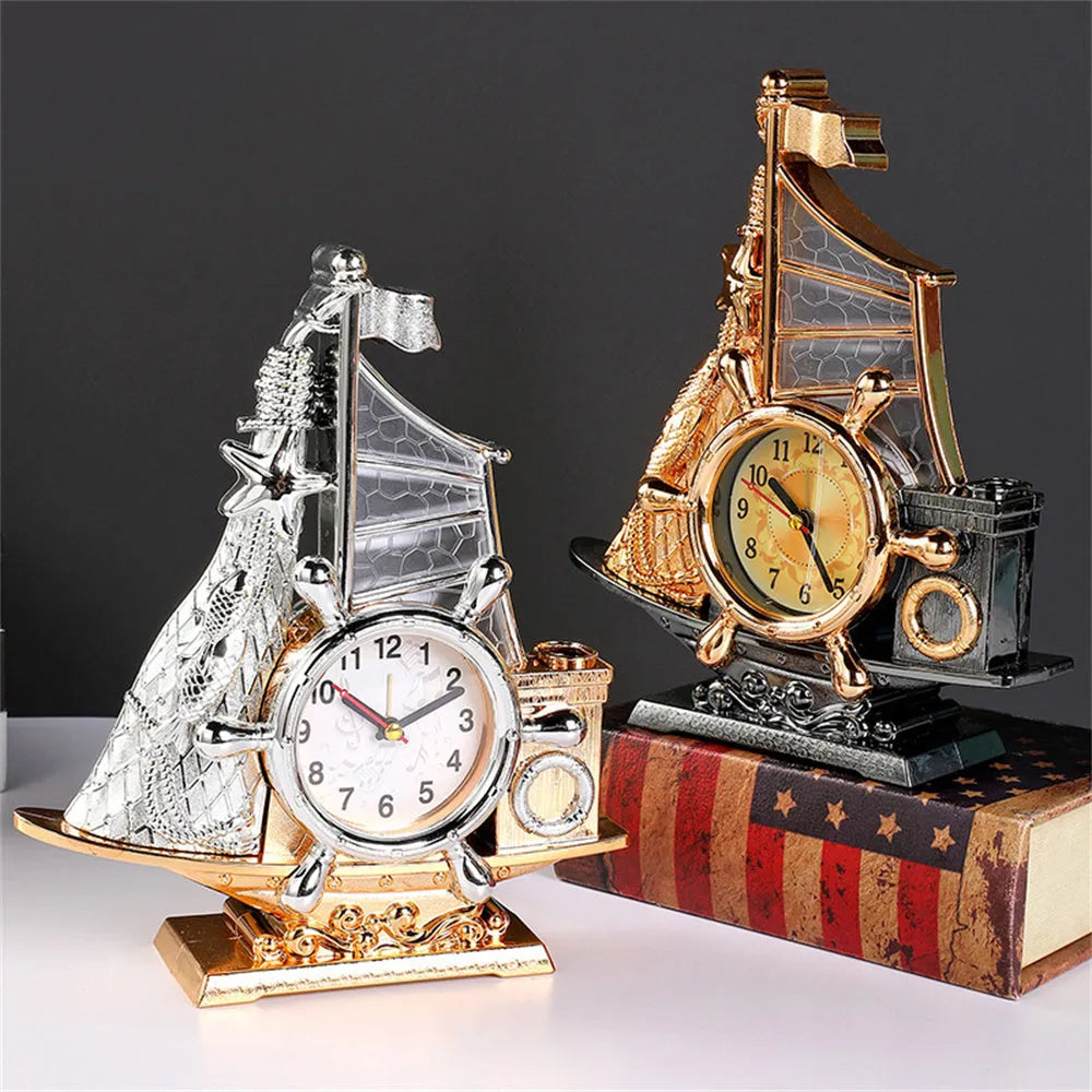 Creative contemporary alarm clock in a choice of gold or silver finish for home decor.