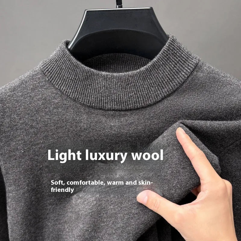 Men's solid colour fine wool half turtleneck long sleeve pullover on a hanger