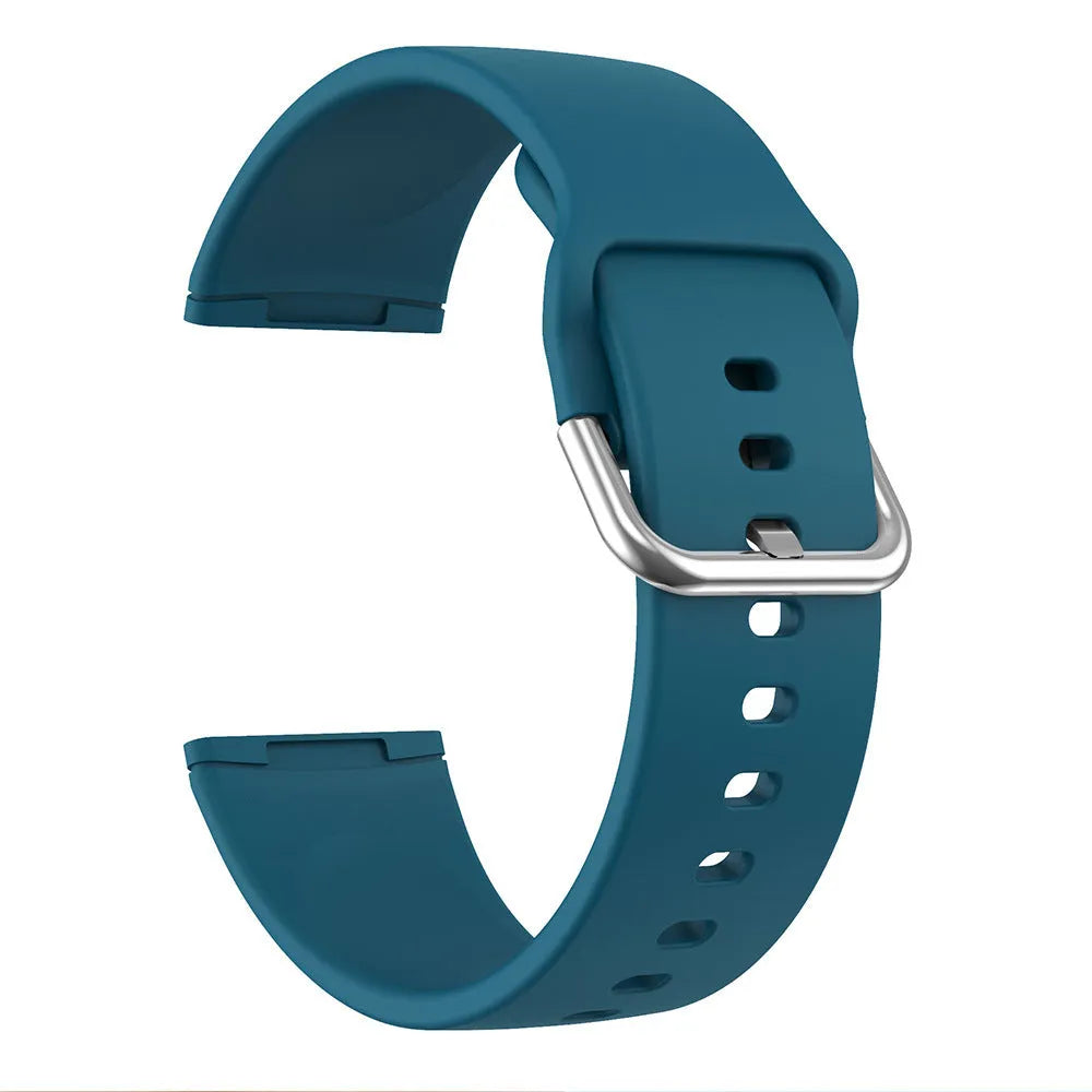 Solid colour silicone replacement strap with silver buckle for Fitbit Versa 3 and Sense 2 fitness trackers.