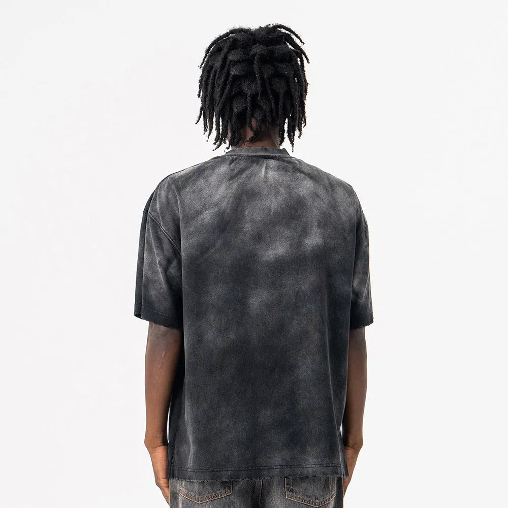 Black men's loose cotton t-shirt with a white letter print and drop-shoulder short sleeves.