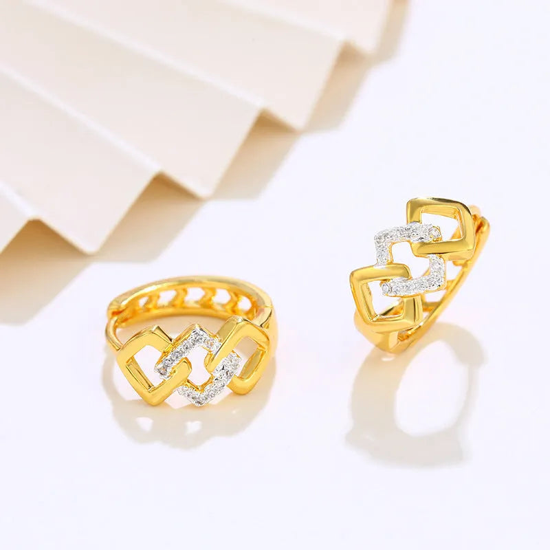 Geometric hollow-out gold alloy earrings with electroplated finish and colour separation detailing
