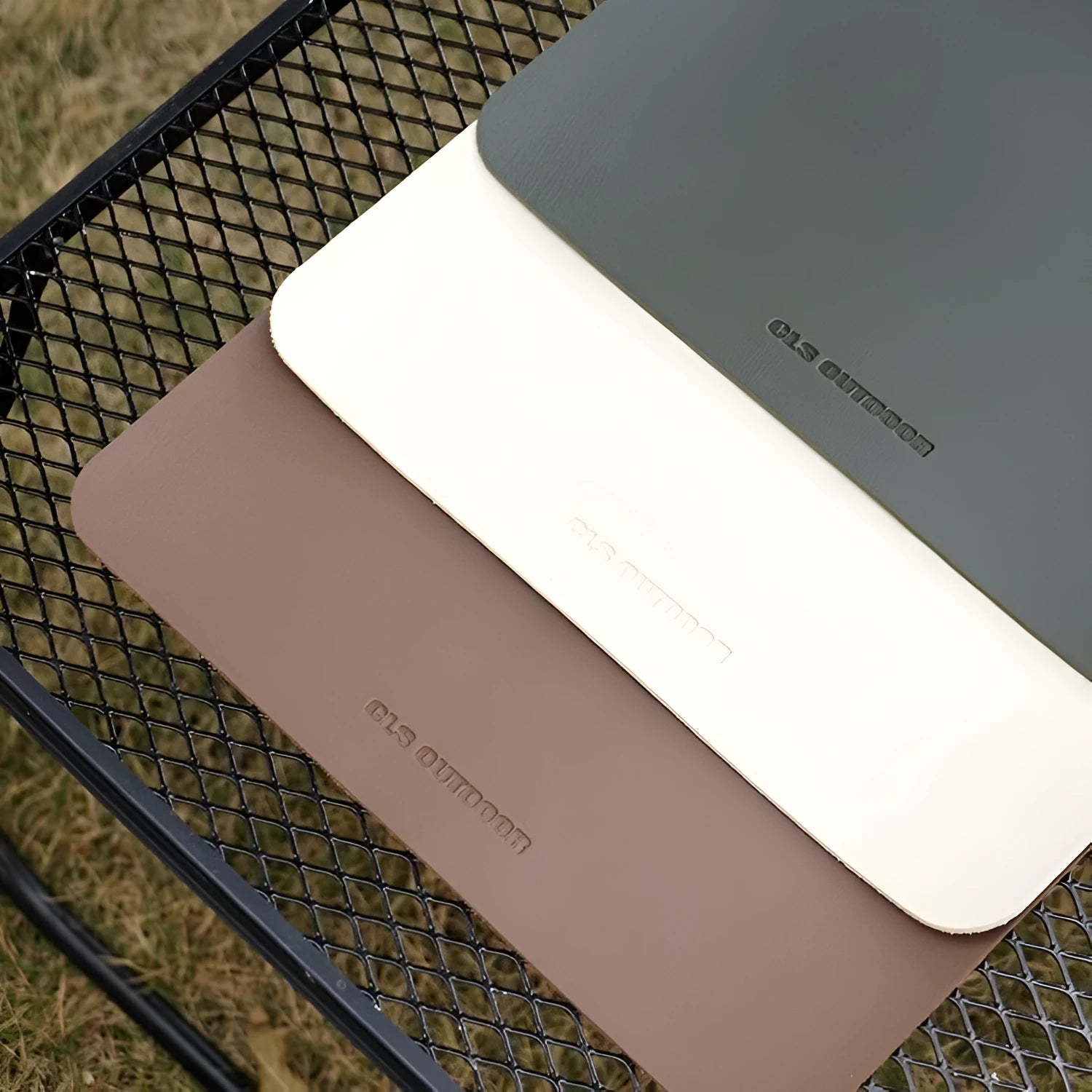 Waterproof PU table mat in beige, large size 56x33cm, with flocked backing, on a dining table