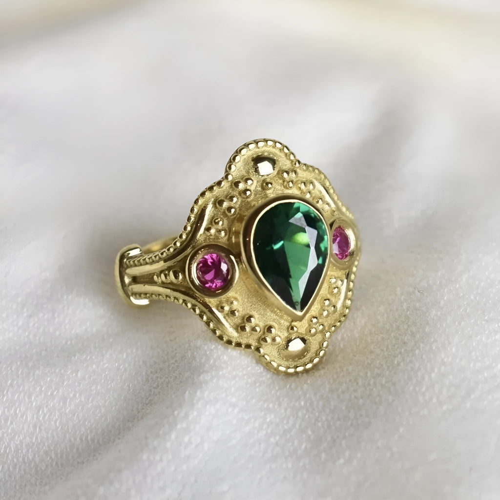 Gold-plated geometric ins style women's ring in golden lvzuan colour on a white background.