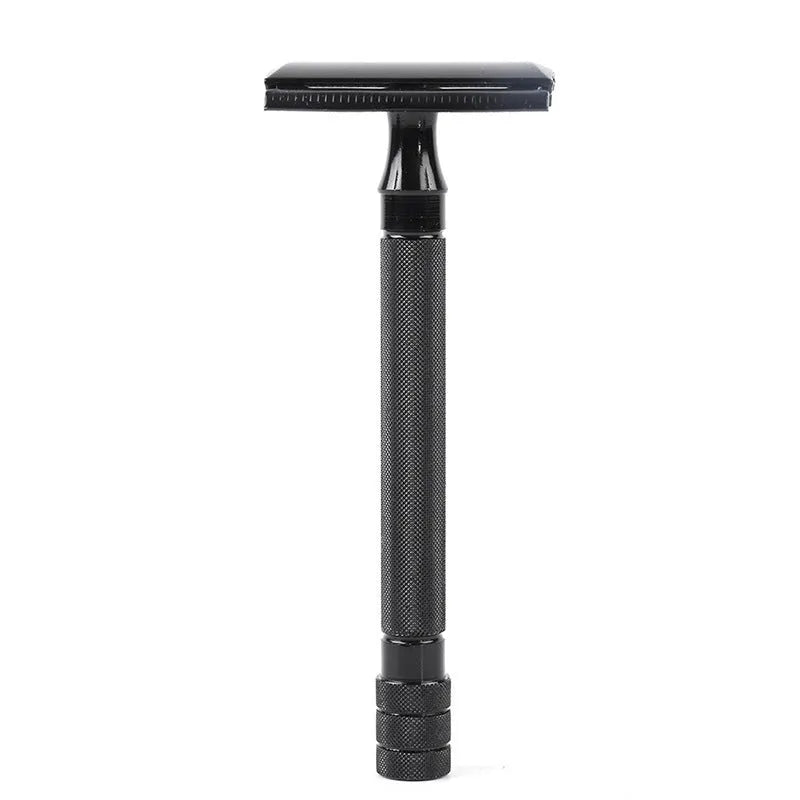 Traditional manual shaving set with safety razor, natural bristle brush and metal scraper tool