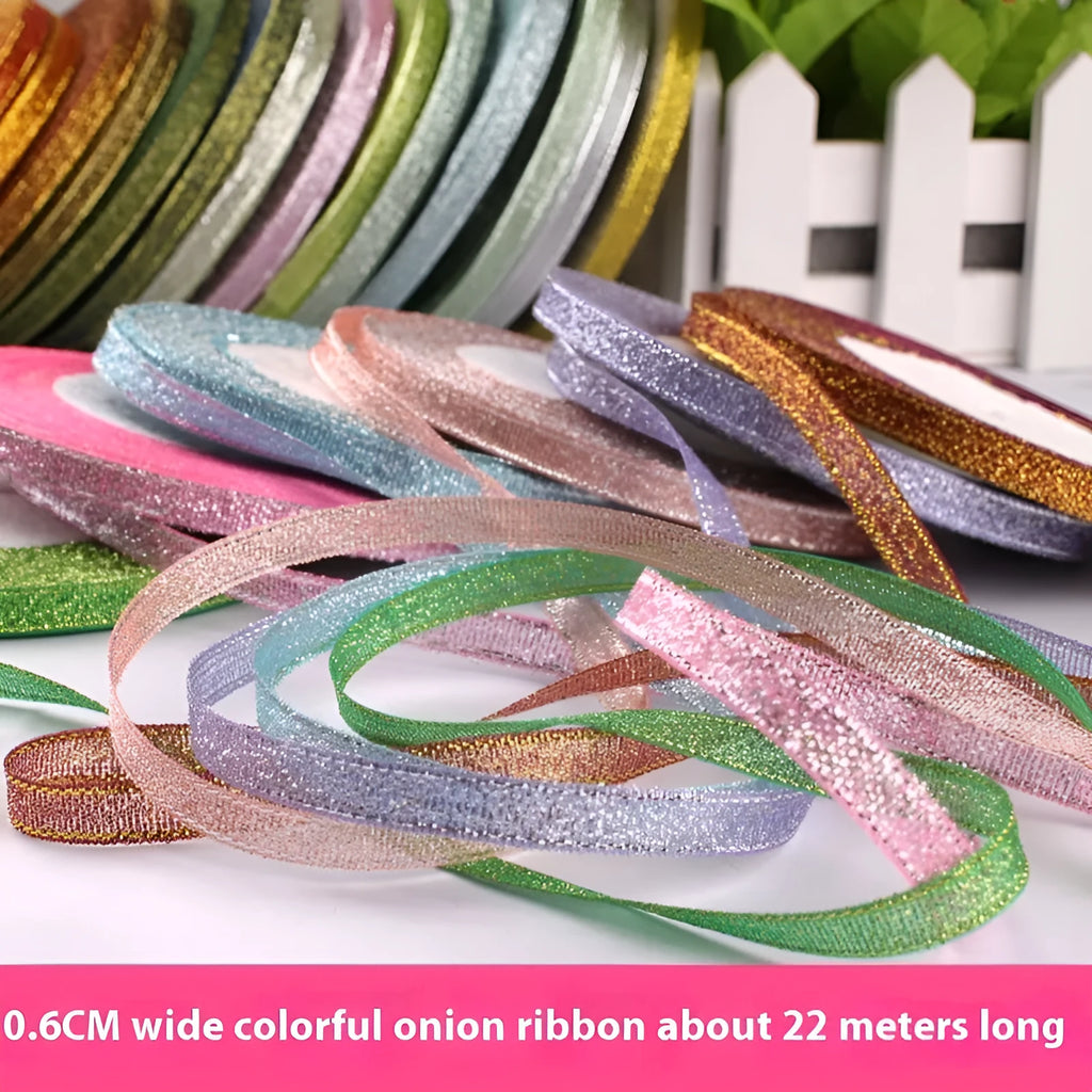 Roll of 0.6cm wide polyester gift ribbon in various colours including gold leaf, coffee and sky blue options