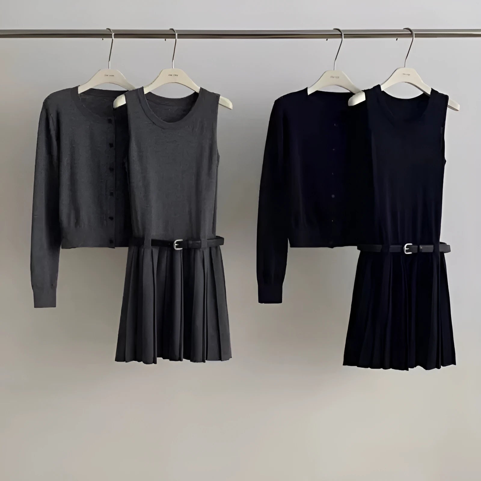 Women's grey knitted two-piece set with vest skirt and long-sleeved cardigan in art retro style