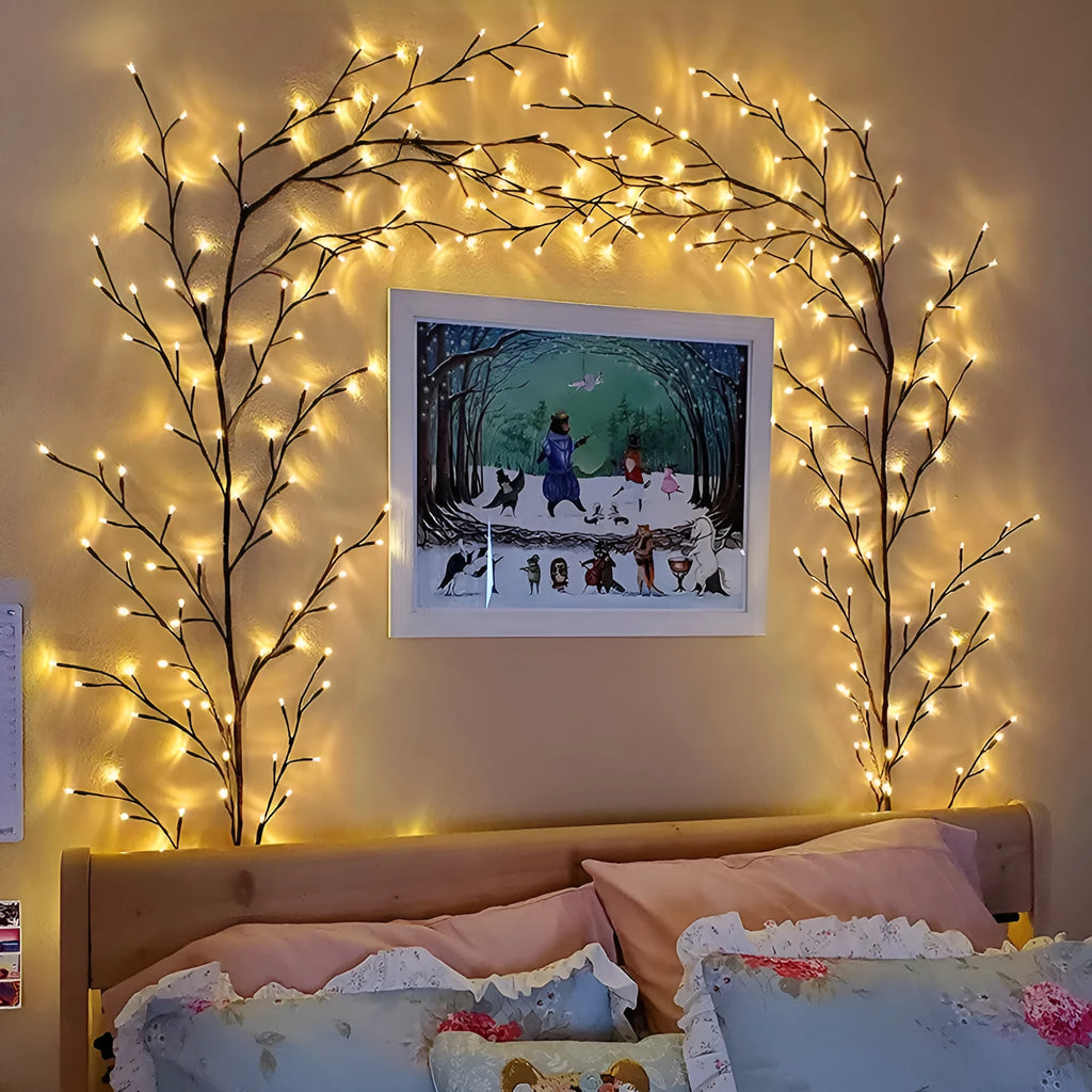 Flexible LED vine light garland with warm white lights on textured birch-bark branches, shaped decoratively.