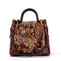 First layer cowhide women's messenger bag with embossed floral pattern, retro square shape, hard handle, and single shoulder strap in brown