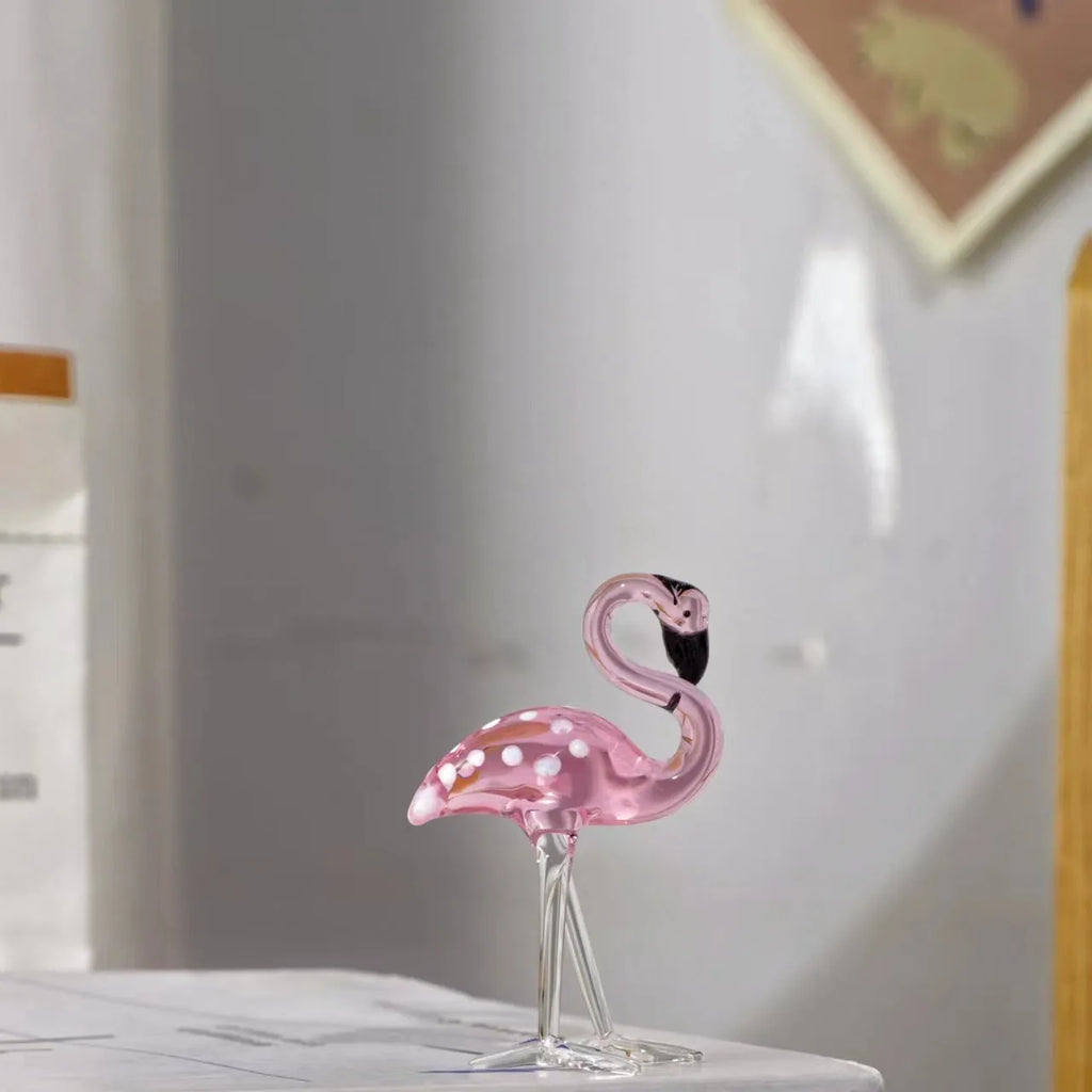 Pink crystal flamingo decorative ornament on tabletop with modern simplicity style