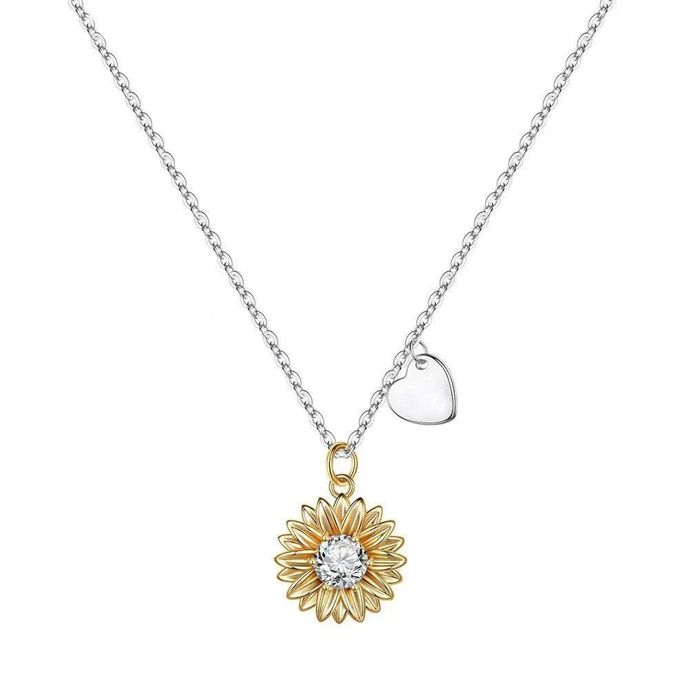 Women's 925 sterling silver sunflower necklace with daisy petal pendant on an adjustable cross chain.