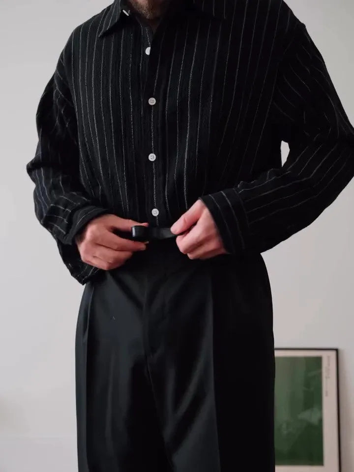 Men's black pinstriped long sleeve button-down shirt with a regular fit.