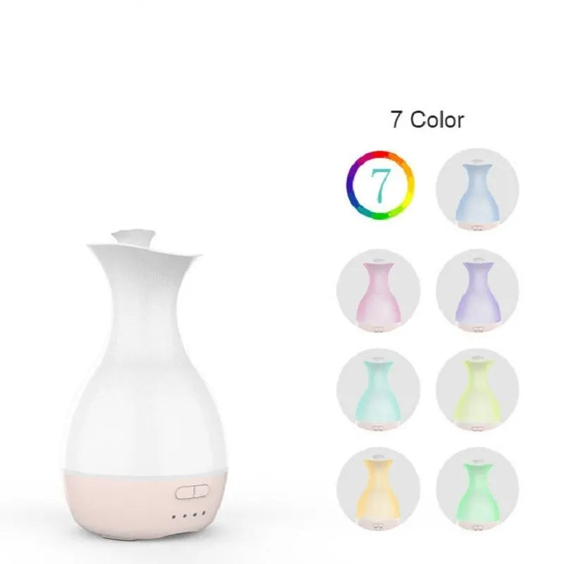 White ultrasonic aromatherapy diffuser with 200ml capacity and multicolour LED lighting on wooden table