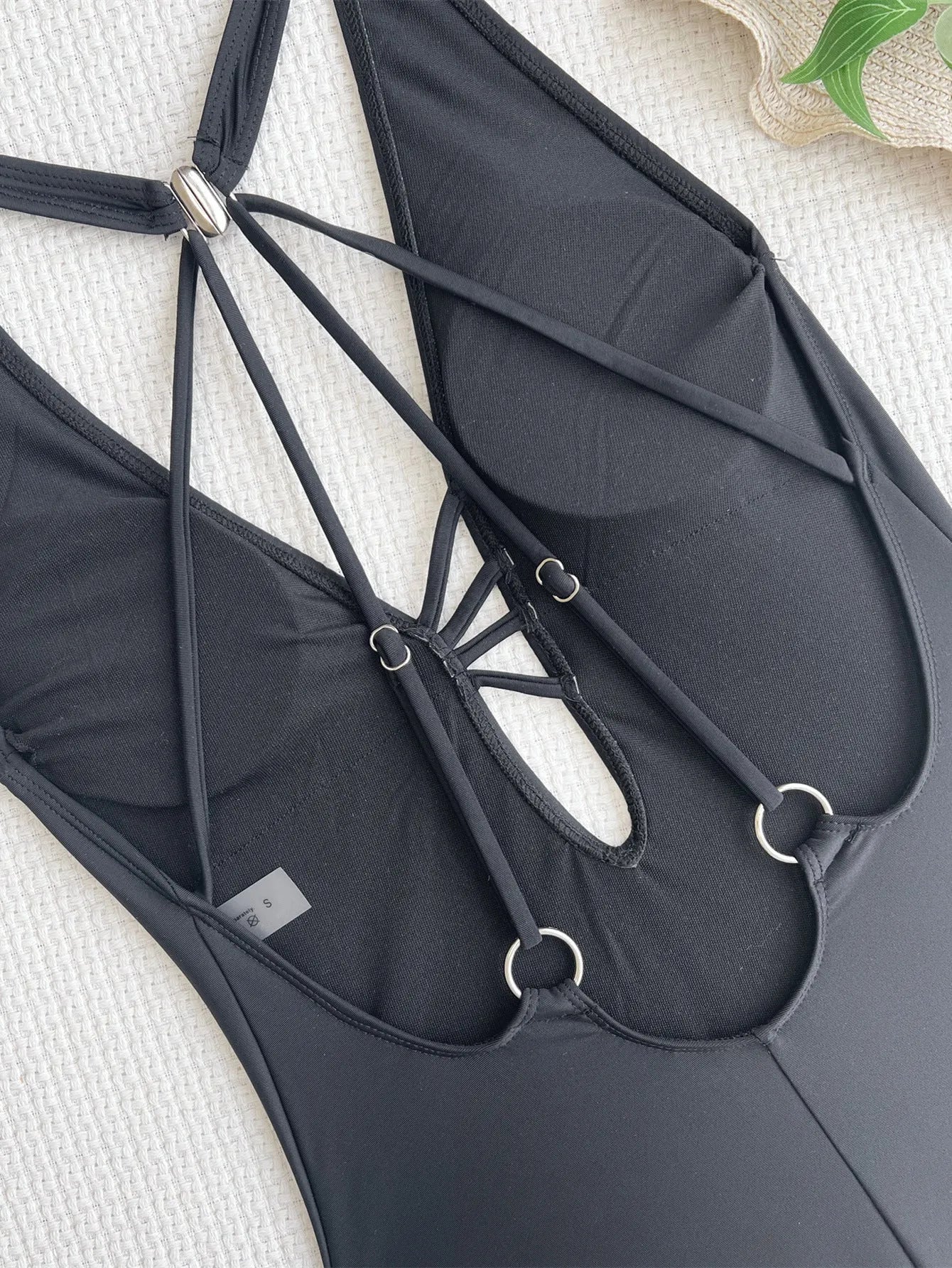 Ladies solid black one-piece swimsuit bikini made from nylon fabric